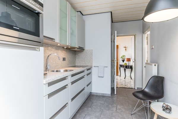 Foto - Verkocht onder voorbehoud: Nette twee- onder- een – kapwoning met serre, zonnige tuin en garage in Bocholtz